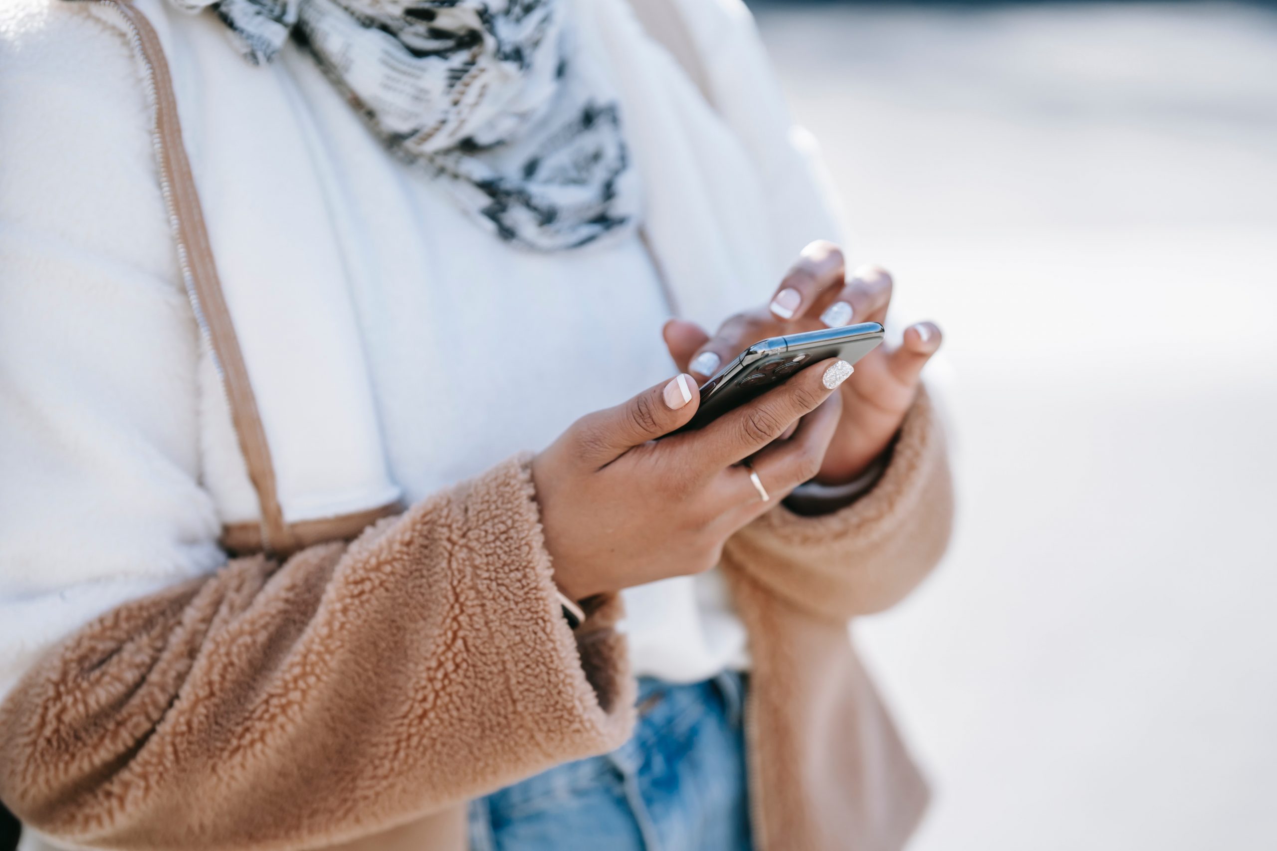 person using thier mobile device