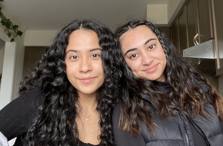 Nishka and Jasmine taking a selfie, smiling into the camera