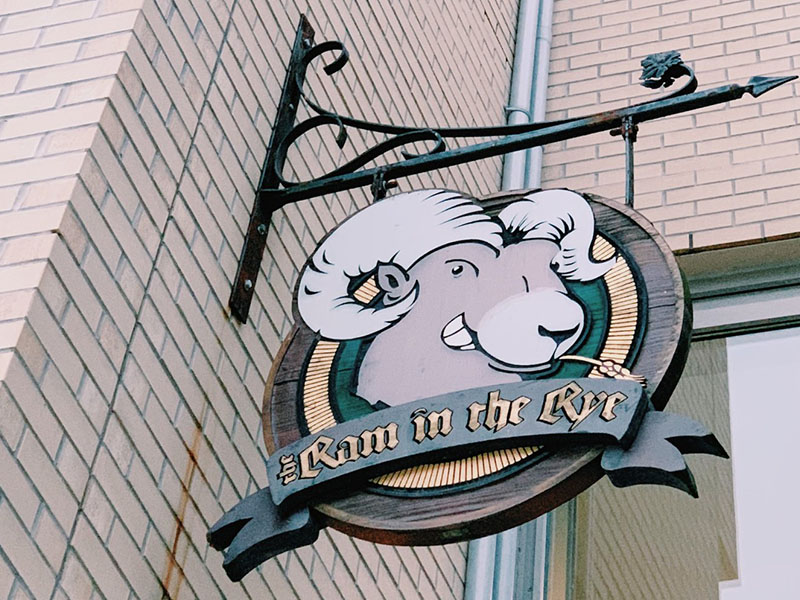 The Ram in the Rye sign showing a smiling ram with wheat in its mouth