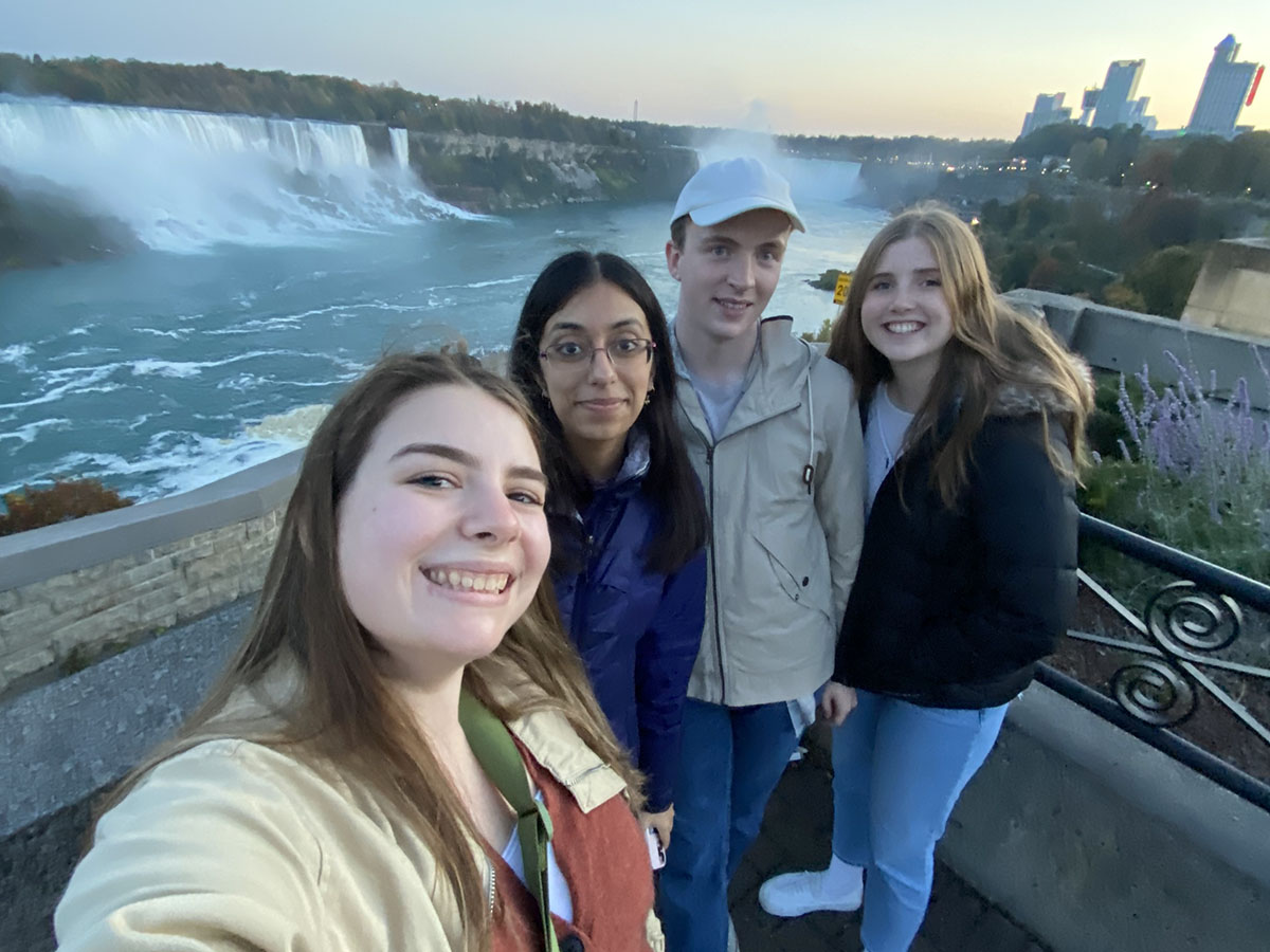 Jenna takes a selfie of her and her friends with Niagara Falls in the background.