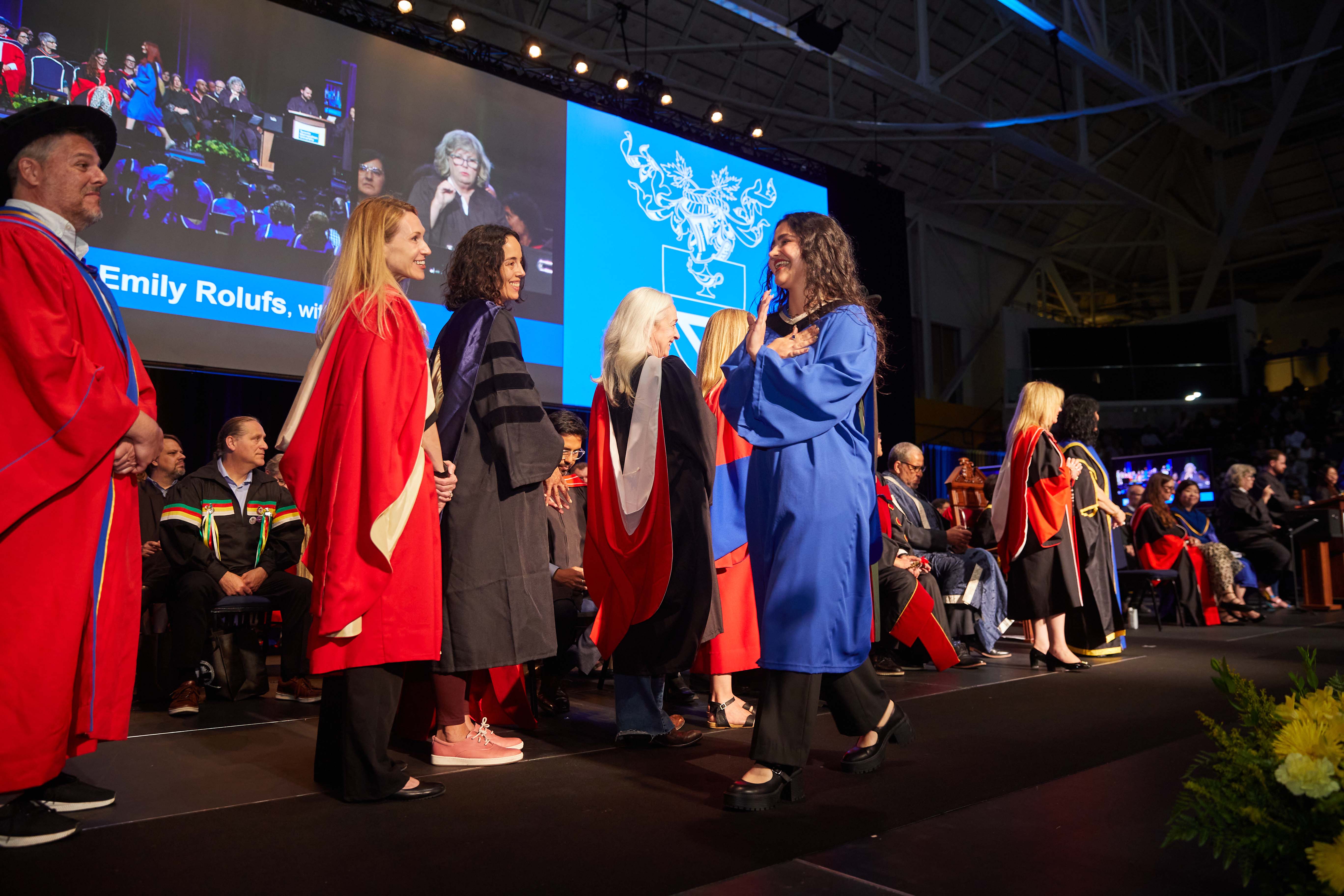 Tara Raessi walks the stage during convocation