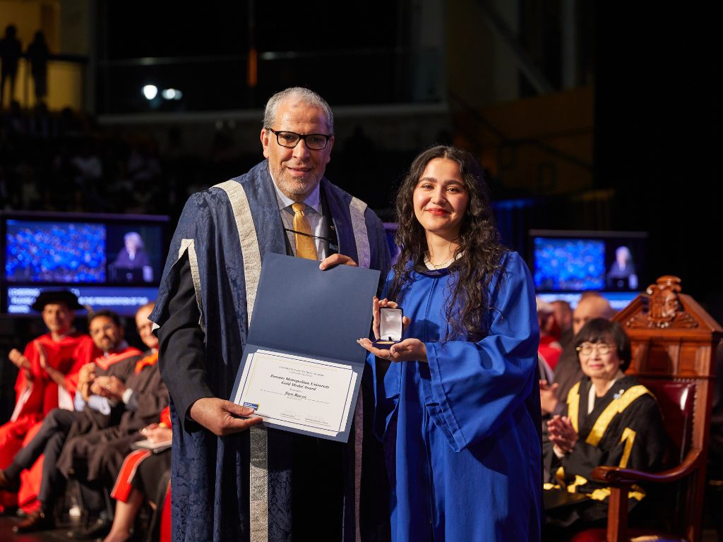 TMU President Mohamed Lachemi and Tara Raessi.