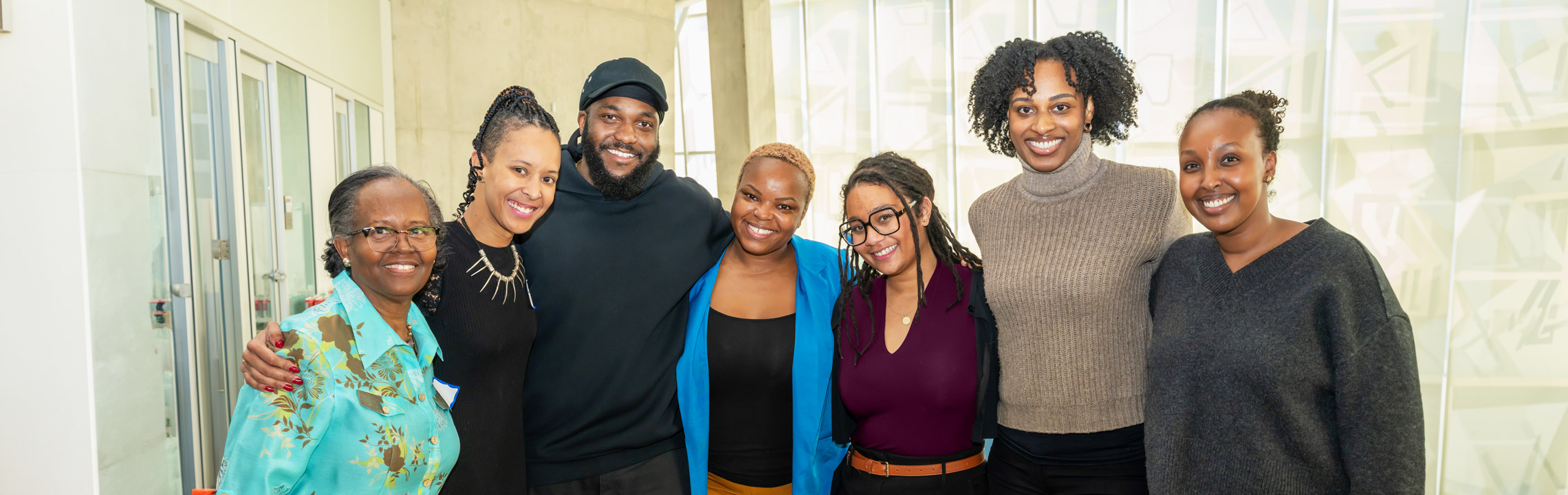 Black TMU community members pose for a group photo together in the SLC.