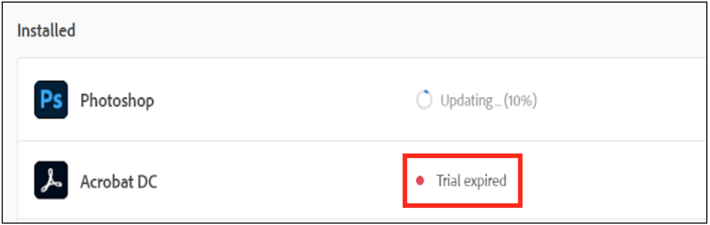 Adobe applications including Photoshop and Acrobat DC are listed on the installed page. Photoshop is displayed to be updating, while the Acrobat DC has a trial expired error.