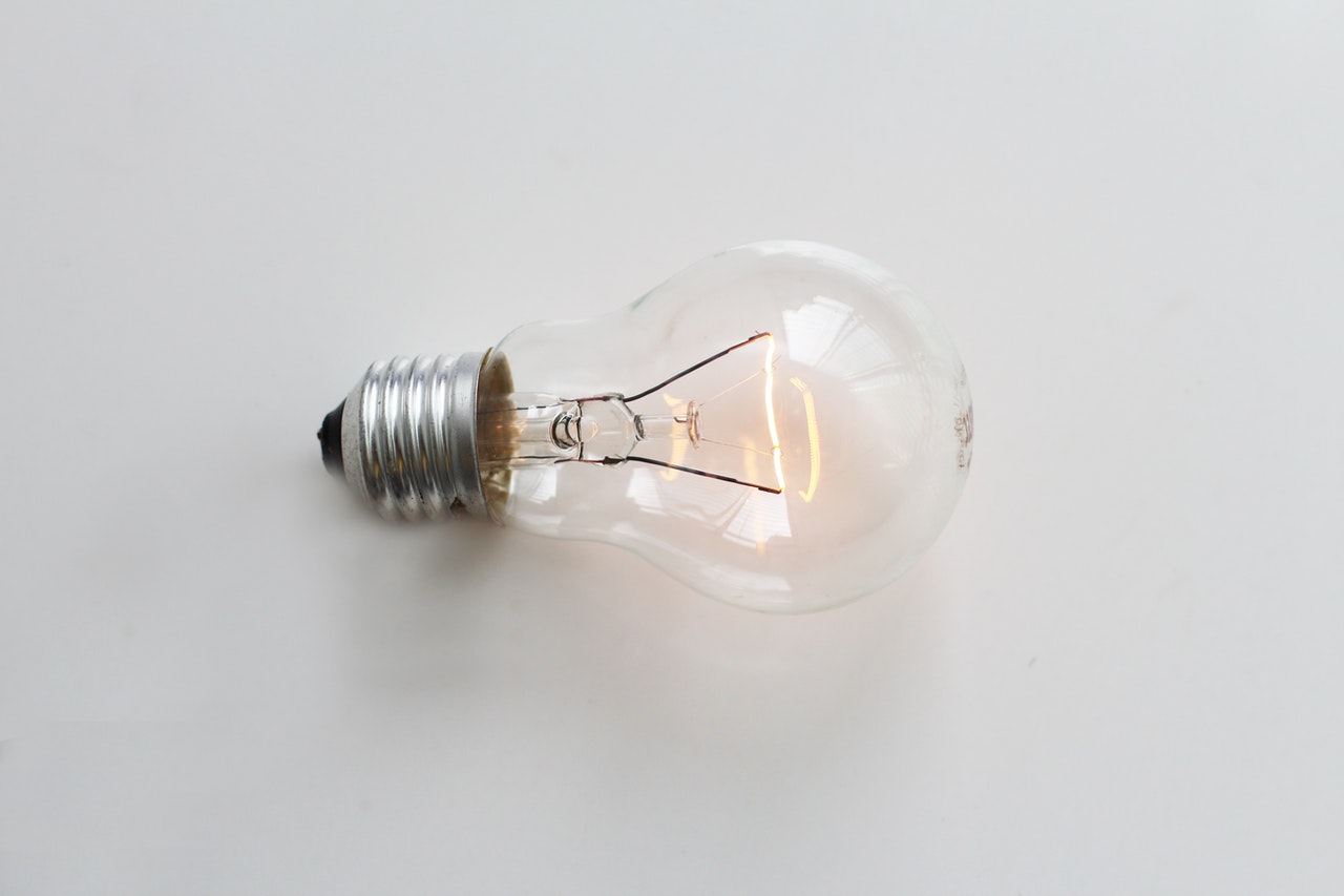 A lightbulb on a white surface