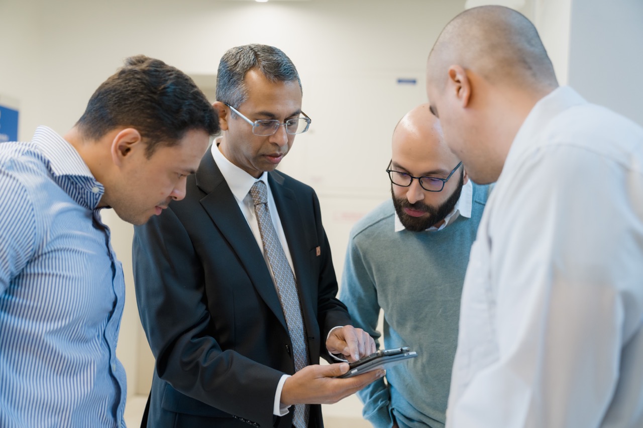 Researchers discussing work