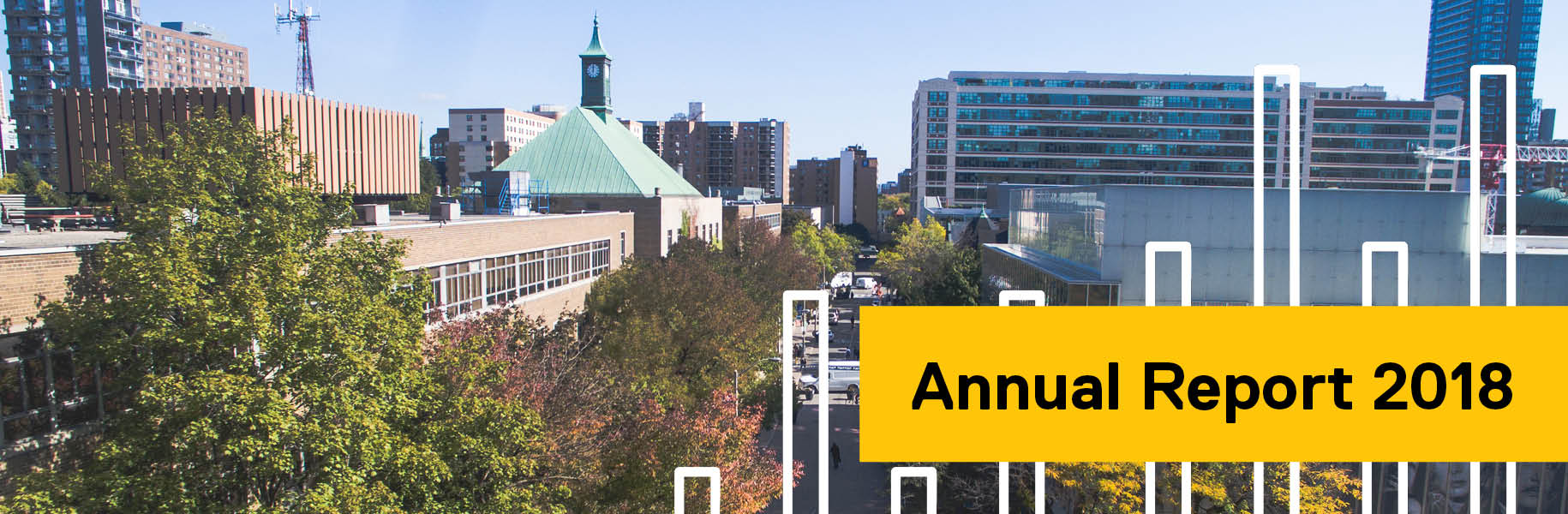 Annual Report 2018: Wide shot of the Ryerson campus showing trees and the clock tower