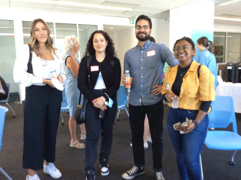 Students posing for a group photo at ComCult orientation