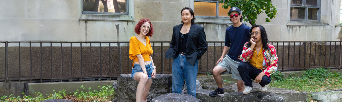 Four Indigenous students on the TMU campus. 