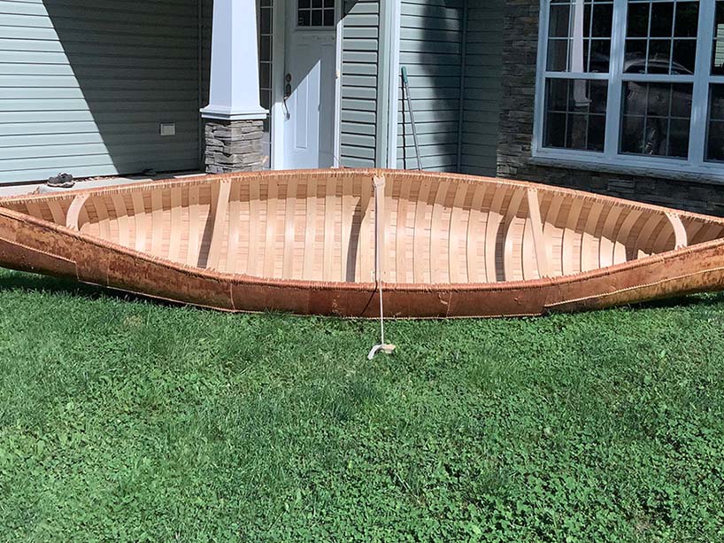  A canoe made out of Birch Bark on green grass