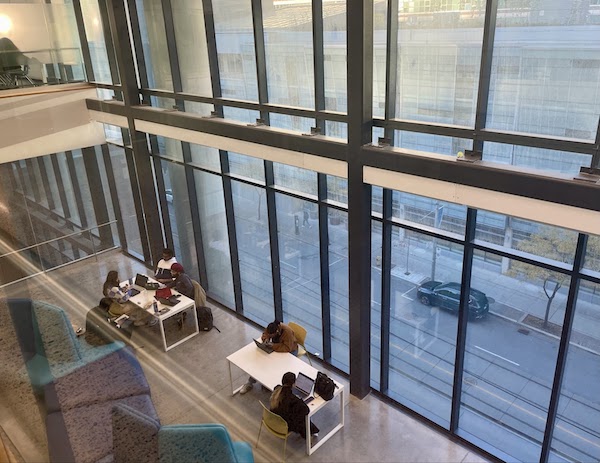 Students working at a study area on the third floor of the Daphne Cockwell Complex 