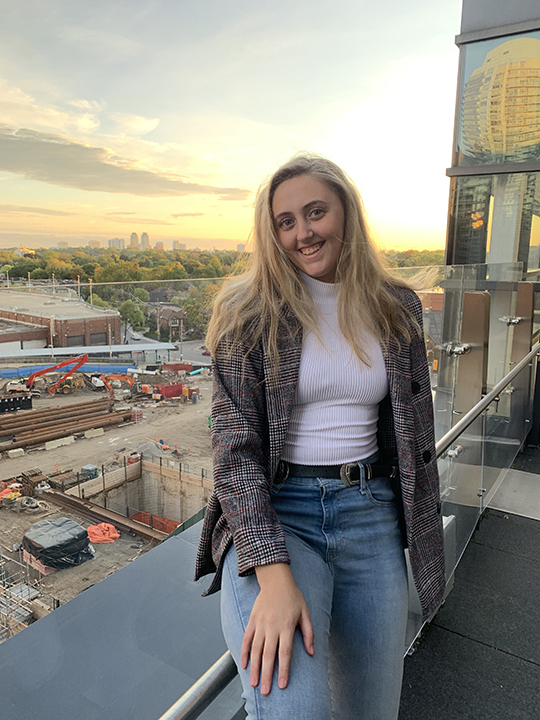 Allissa Hibbs overlooking a city.