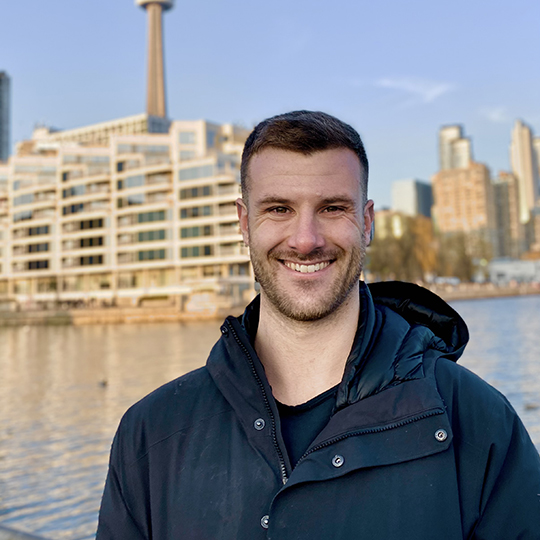 Patrick Swadden in front of Lake Ontario.