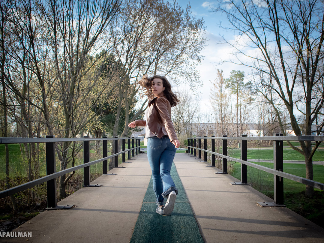 Sarah Tomlinson walking in a park