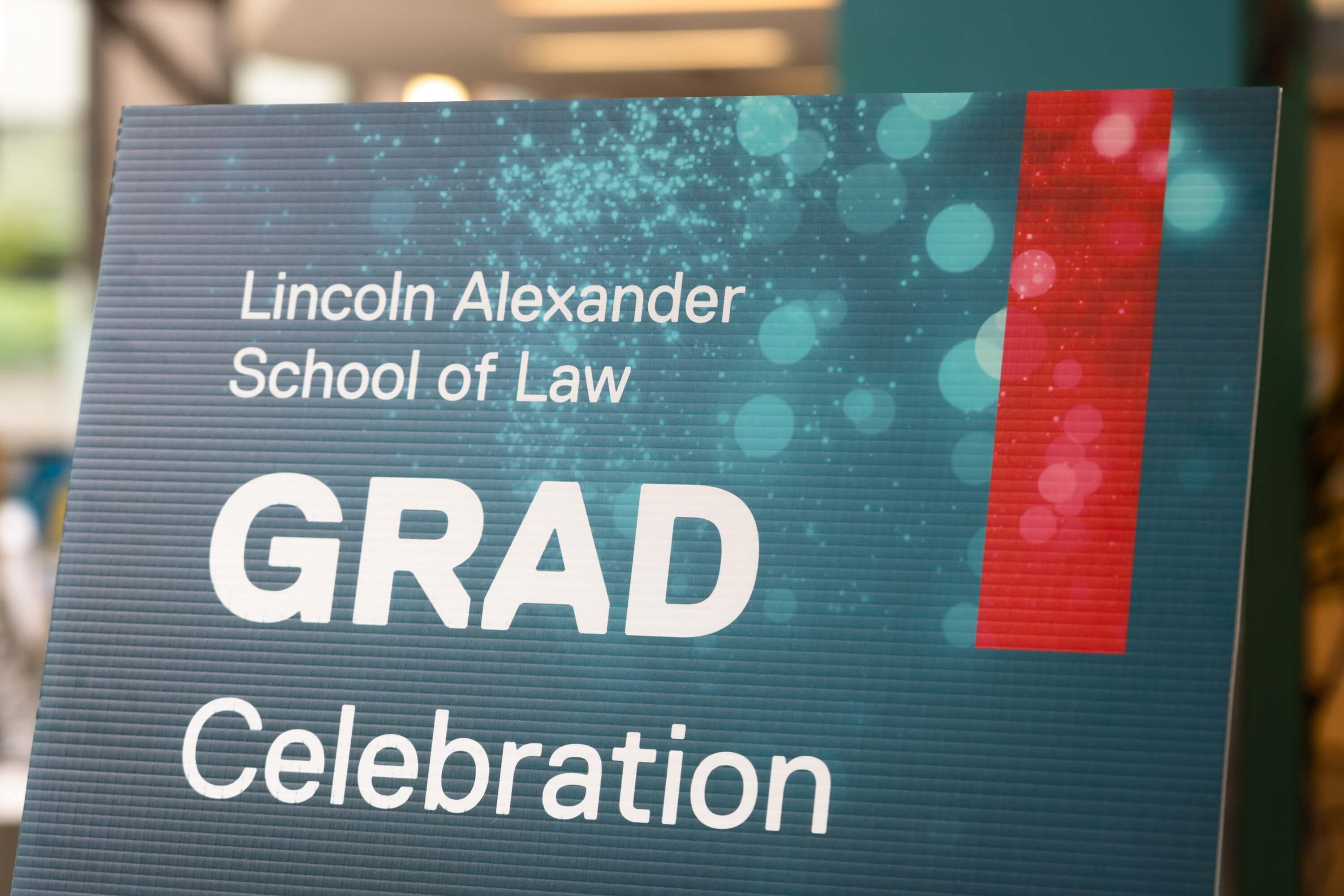 Lincoln Alexander School of Law Grad Celebration sign.