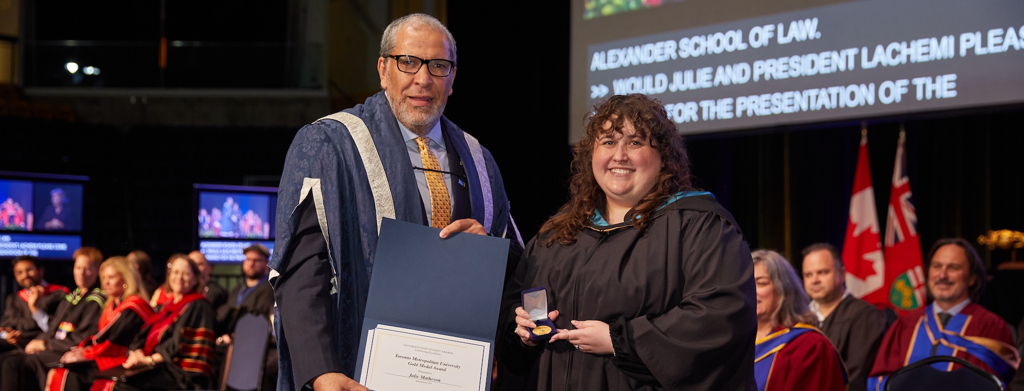 President Lachemi presenting Julie Matheson with the TMU Gold Medal for 2024 at Convocation.