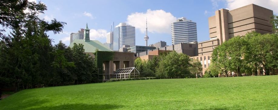 The TMU quad in summer with Toronto skyline behind
