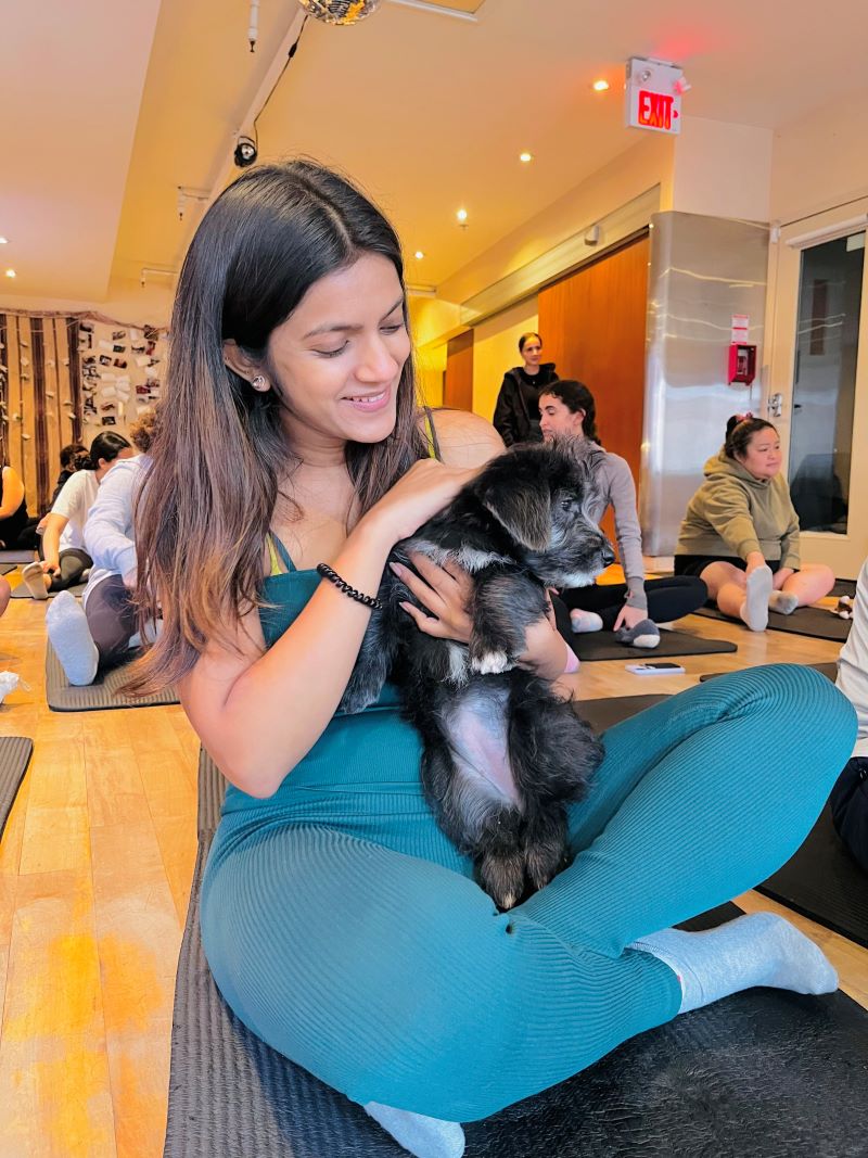 Girl holding puppy