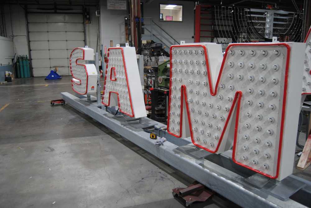 Sam the Record Man sign in a storage