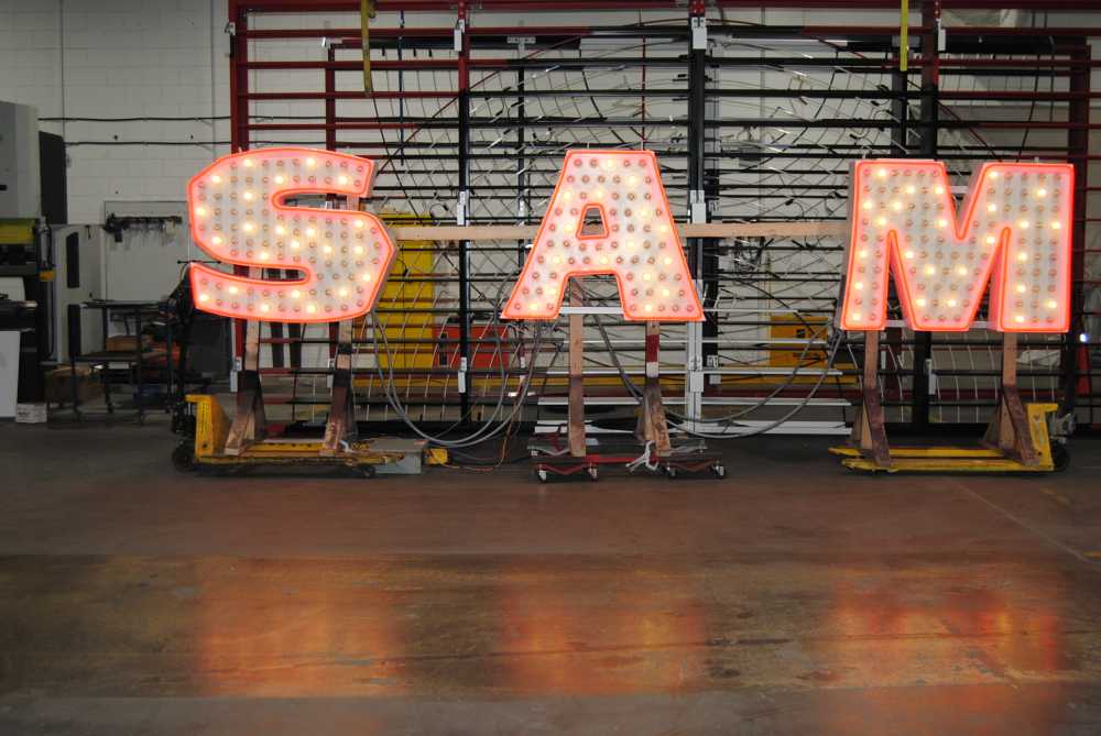 Sam the Record Man sign in a storage