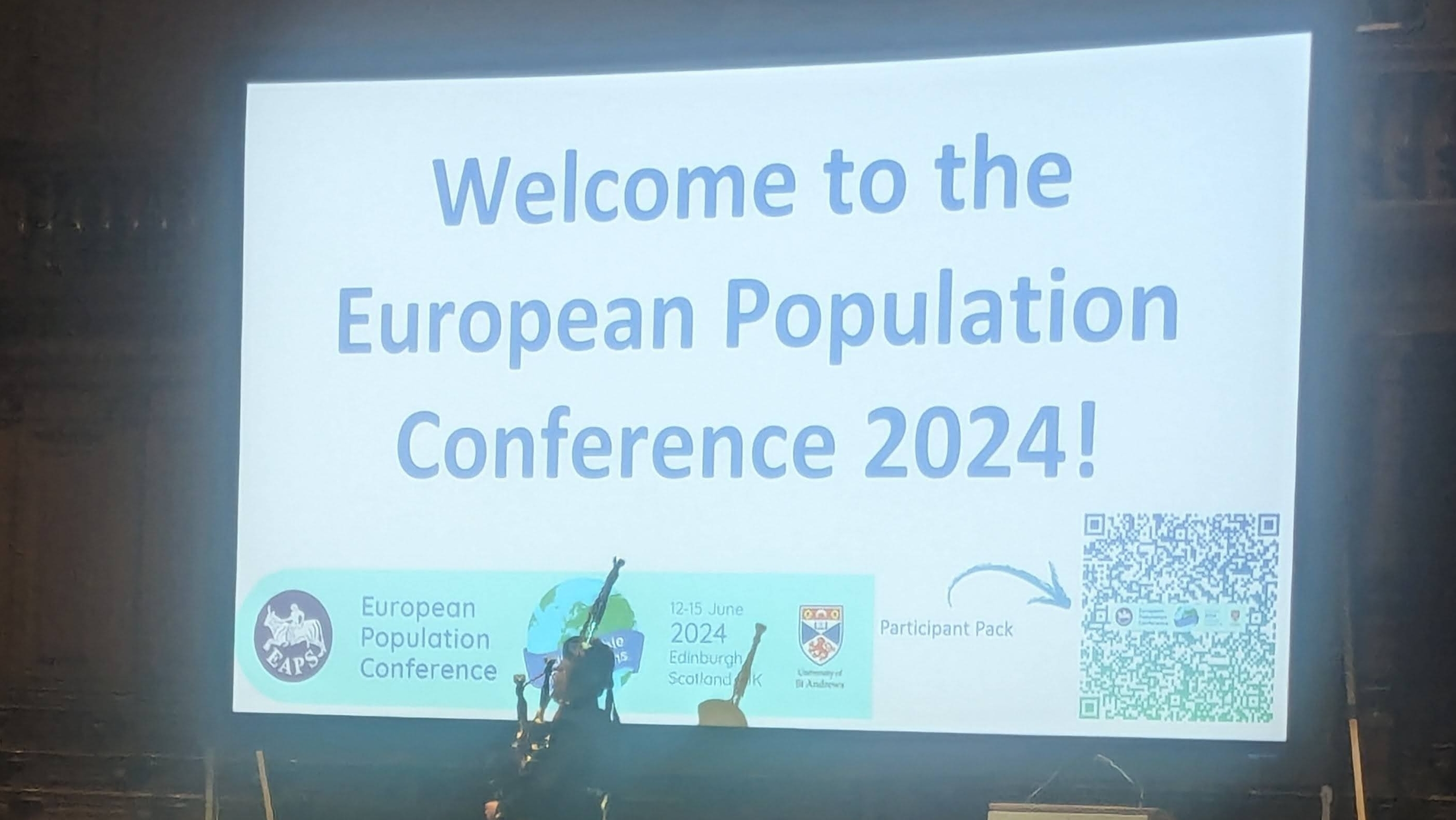 Projection screen reading Welcome to the European Population Conference 2024!