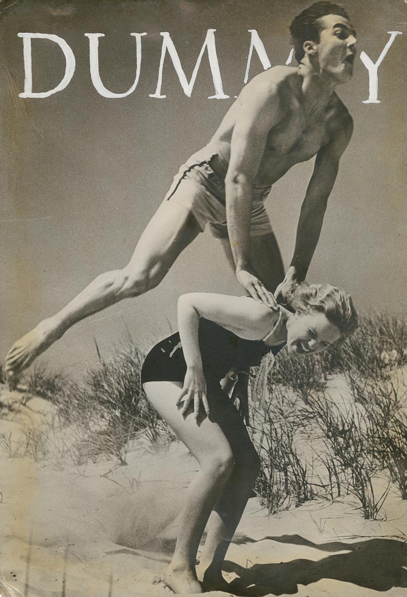 A man is shown leap-frogging over his girlfriend on a beach during their holiday