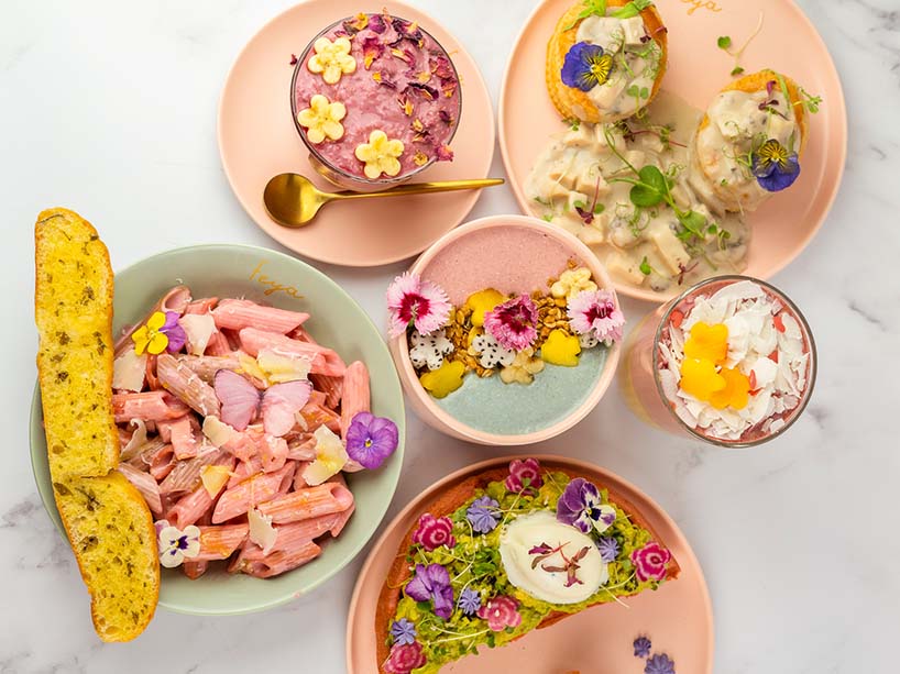 Food with flowers on a table.