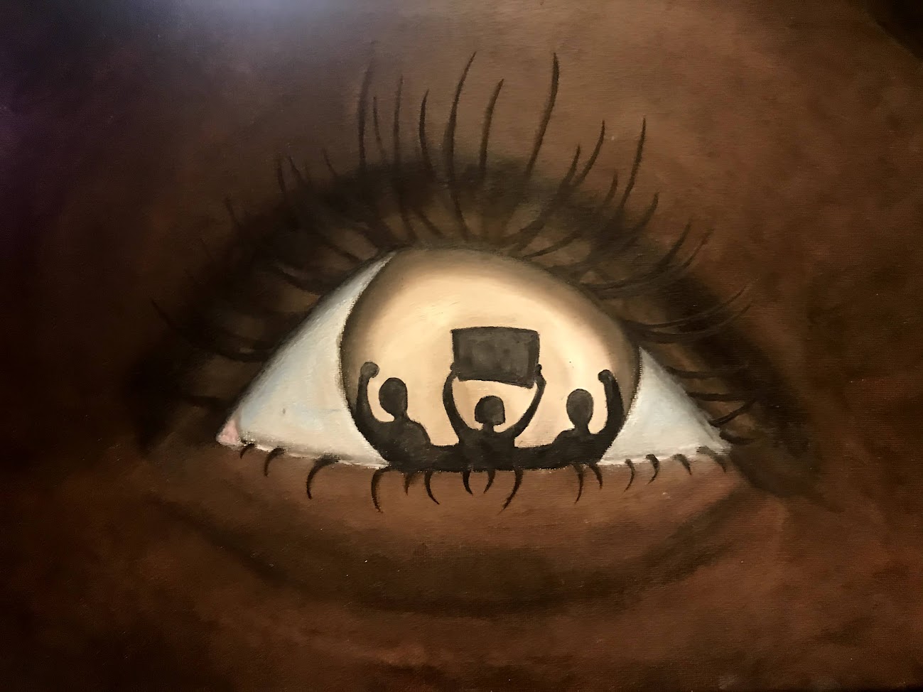 Painting of an eye with an image reflected of silhouetted protestors.