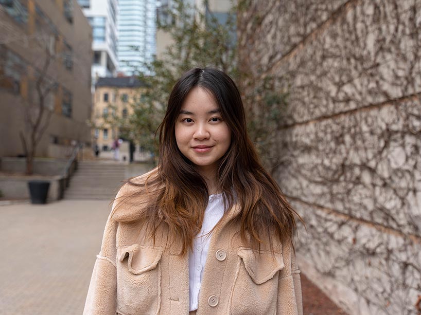 Jennifer Nguyen in a beige sweater.