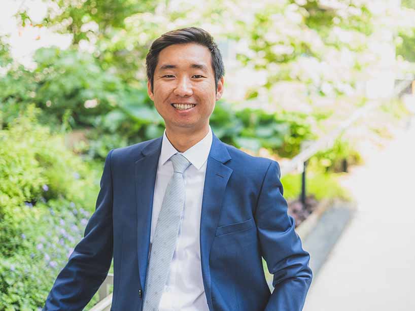 Leo Cho in a blue jacket and tie. 