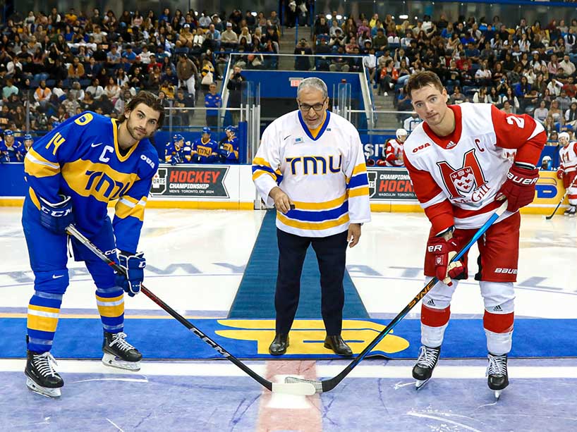 Chris Playfair, Mohamed Lachemi and Taylor Ford participate in a ceremonial puck drop