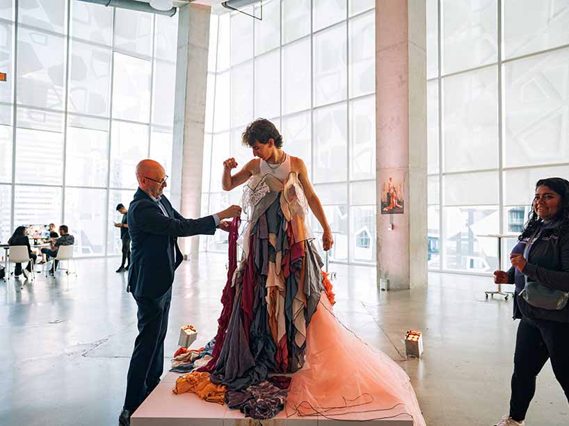 Person wearing floor length gown at the Student Learning Centre. 