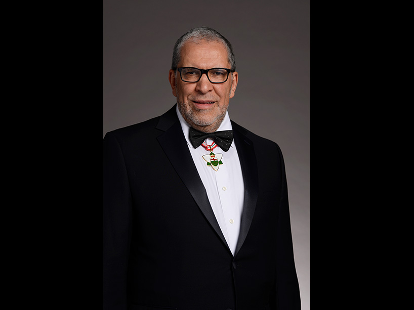 Mohamed Lachemi wears the Order of Ontario medal.