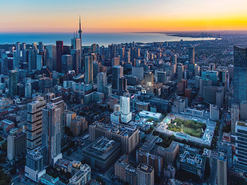 An aerial view of the Toronto skyline with the TMU quad.