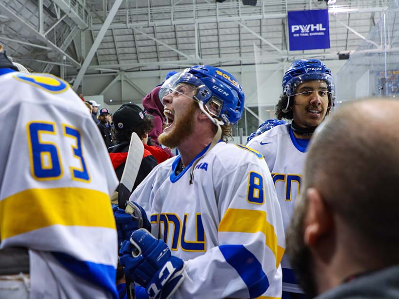 Jackson Doherty of the TMU Bold smiles and cheers after the team’s victory on Thursday, March 14.