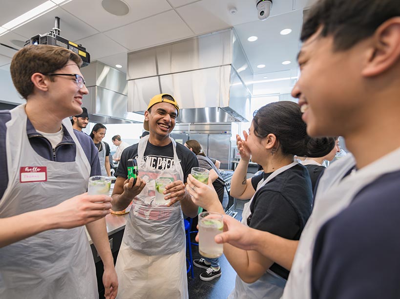 Four students enjoy a mocktail  