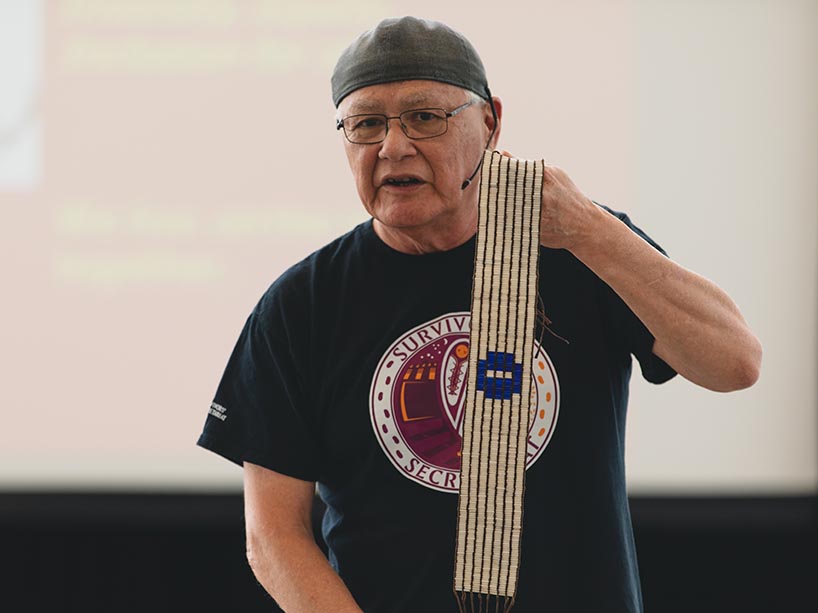 Michael Doxtater holds the One Dish wampum belt.