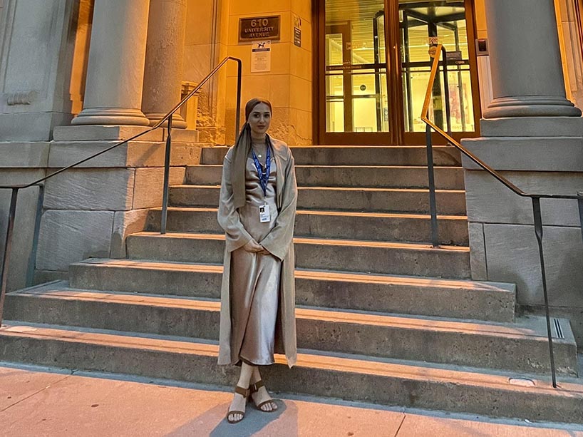 Marwah Azizi stands in front of the stairs outside Princess Margaret Hospital. 