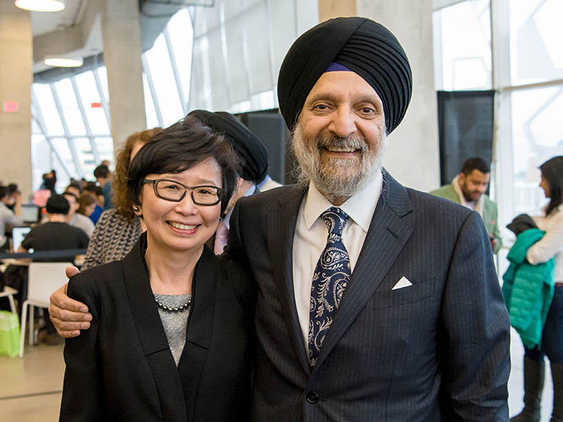 Janice Fukakusa with Sabi Marwah, smiling. 