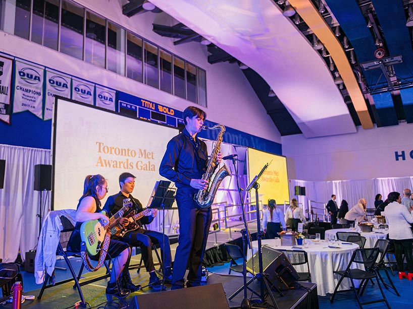 A saxophone player performs at the Toronto Met Awards Gala.