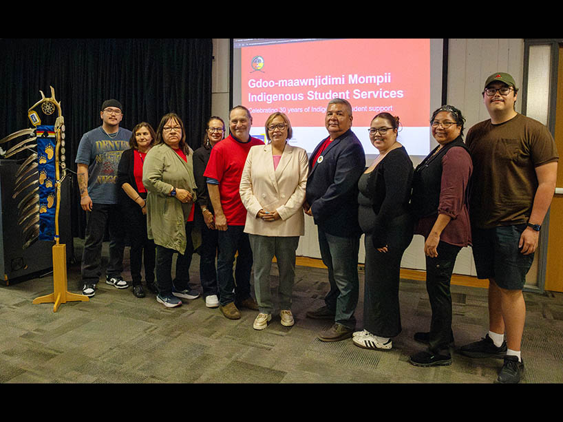 GMISS staff stand with Director of Indigenous Initiatives and GMISS founder Monica McKay at the centre.