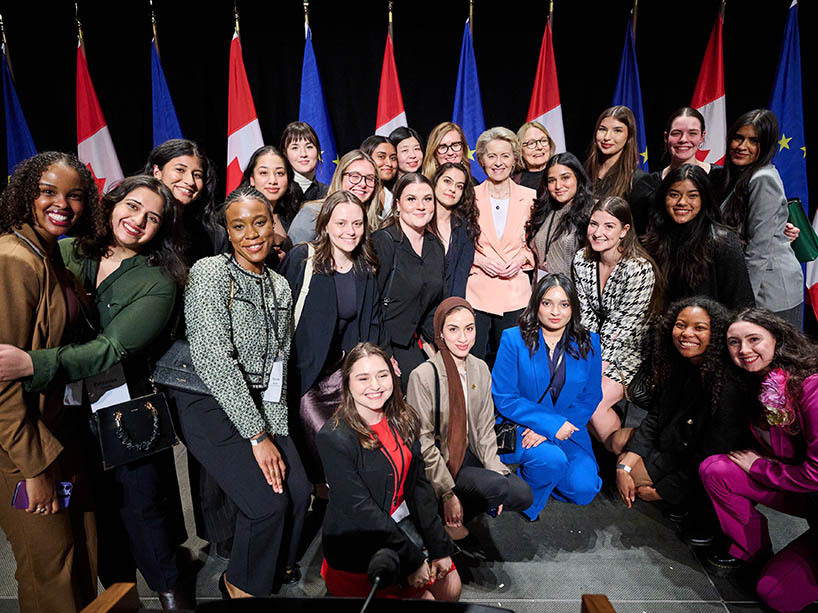 A group of women posing together for a photo. 