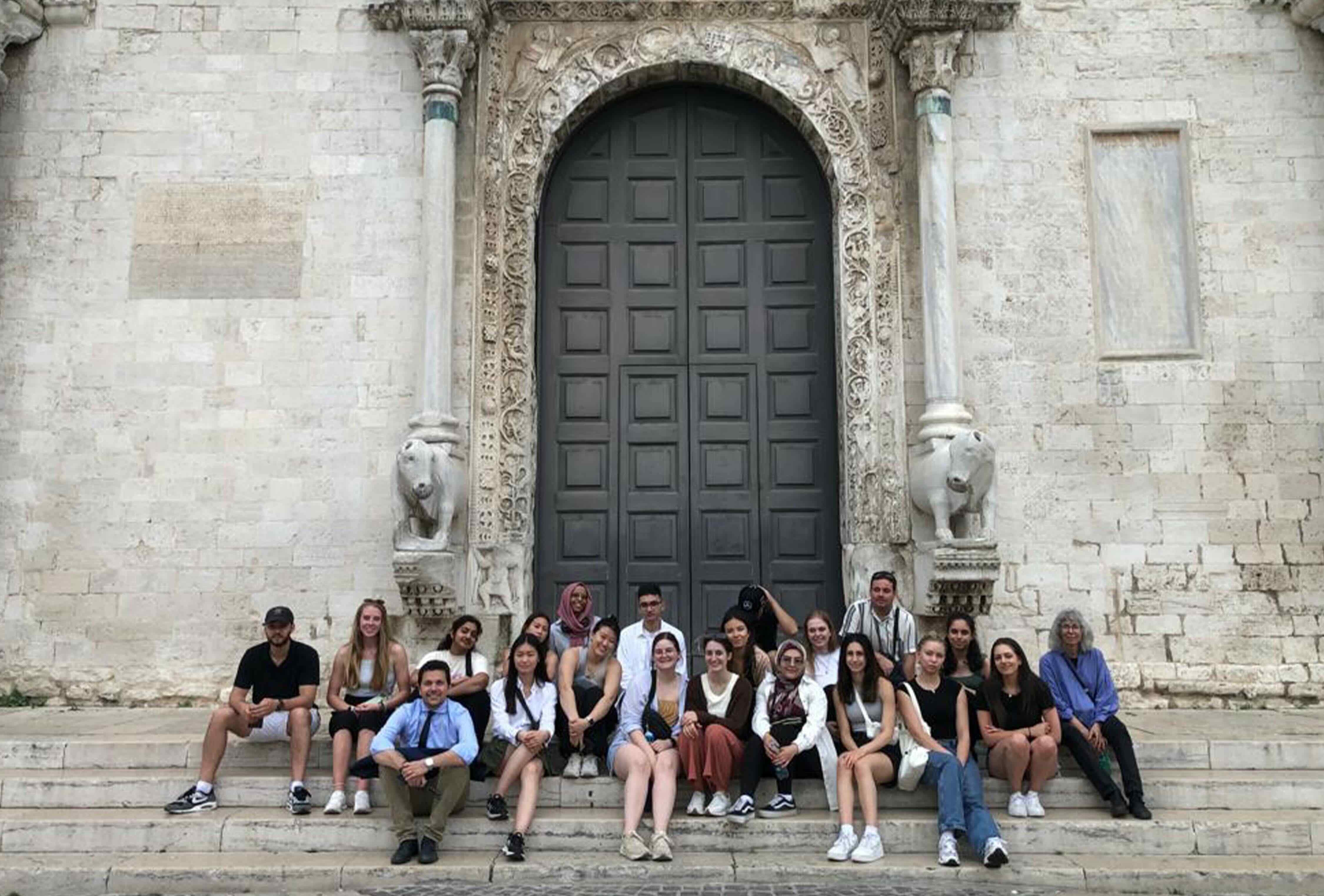 Students on steps in Bari, Italy