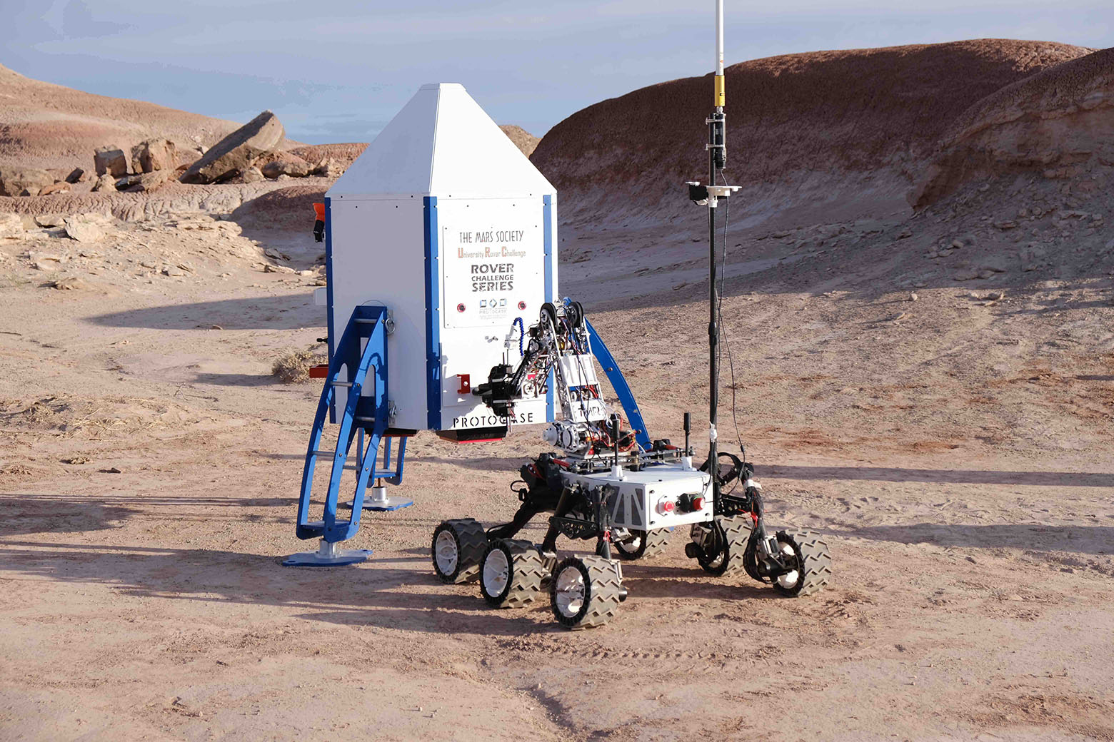 Toronto MetRobotics' University Rover Challenge rover on dry bumpy landscape.