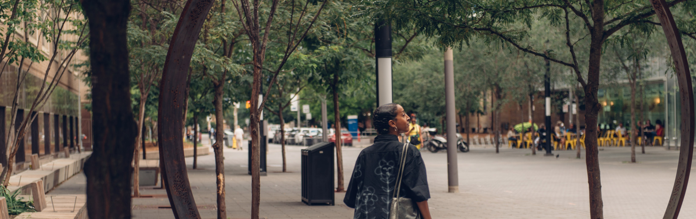 A student walks through "The Ring", an Indigenous Acknowledgement Installation on Gould Street.