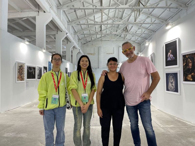 Rob Davidson, his partner Nadia Cheema and two others at the Pingyao International Photo Festival.