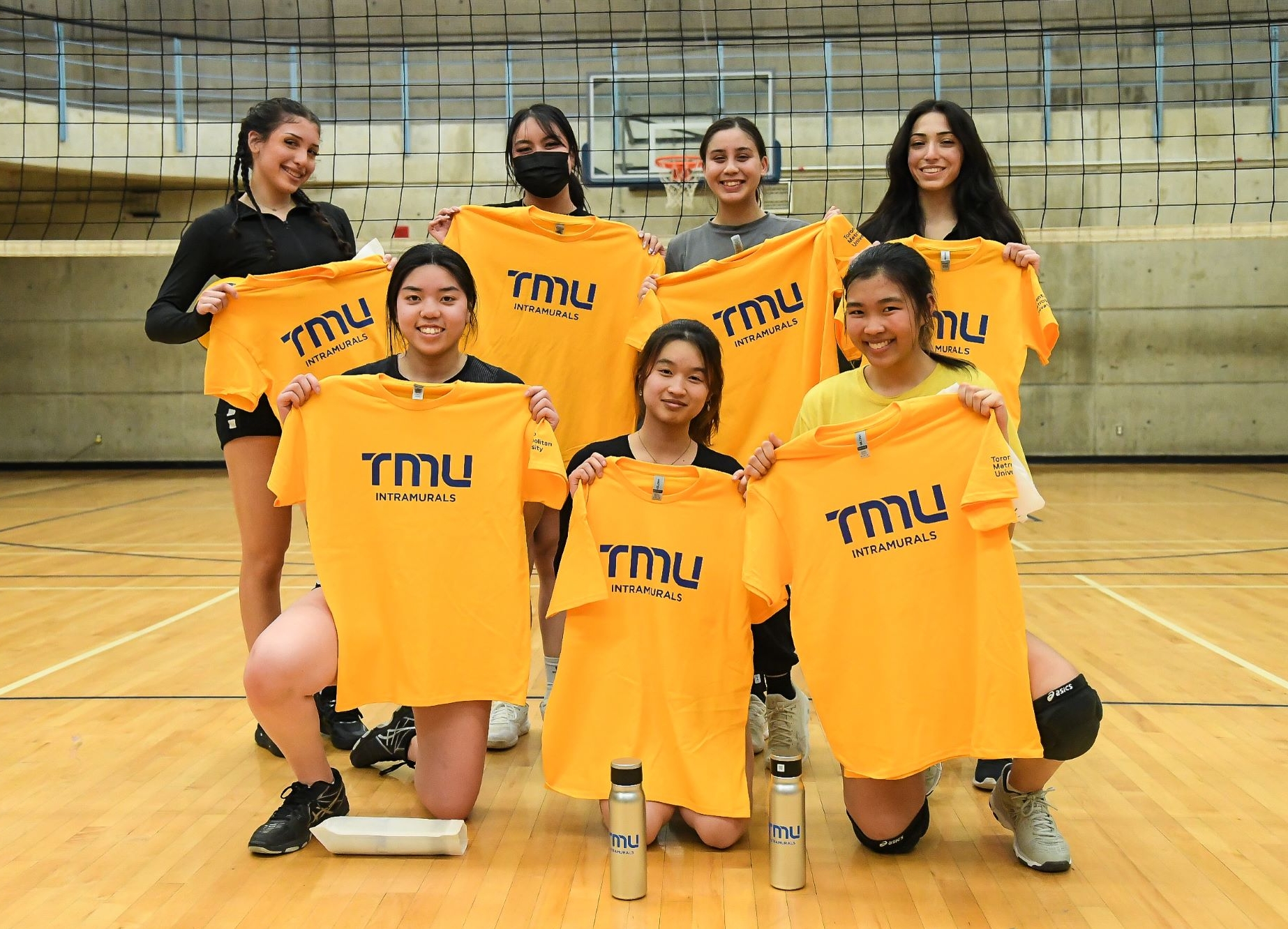 Women's intramural volleyball participants pose in one of the RAC gyms.