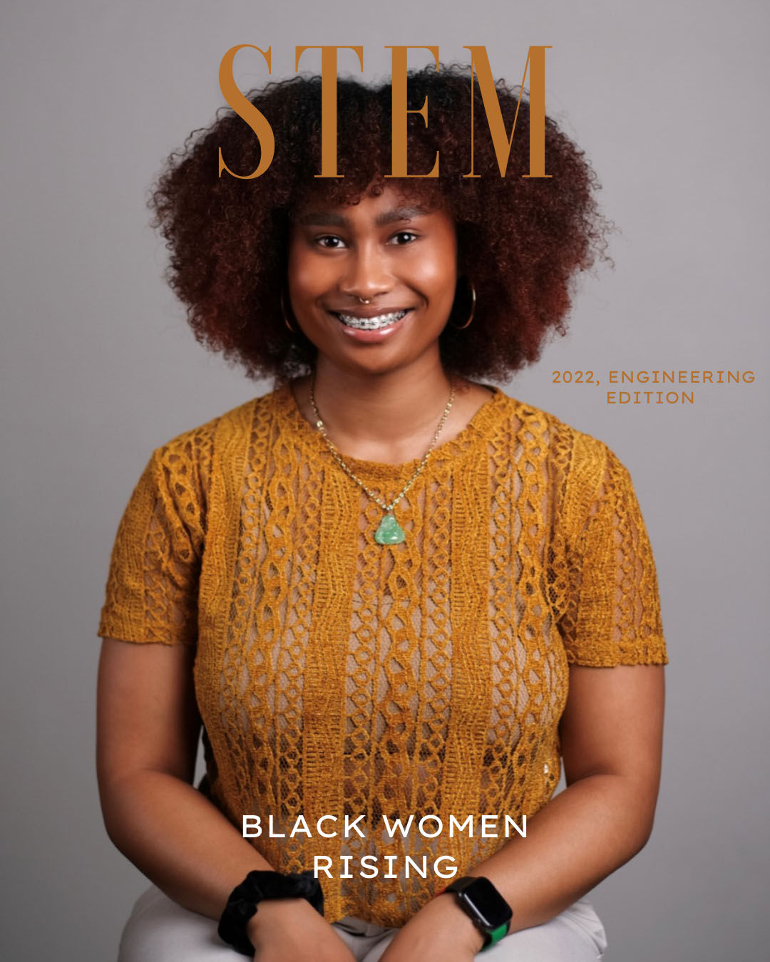 Woman smiling on the cover of the second issue of STEM Mag.