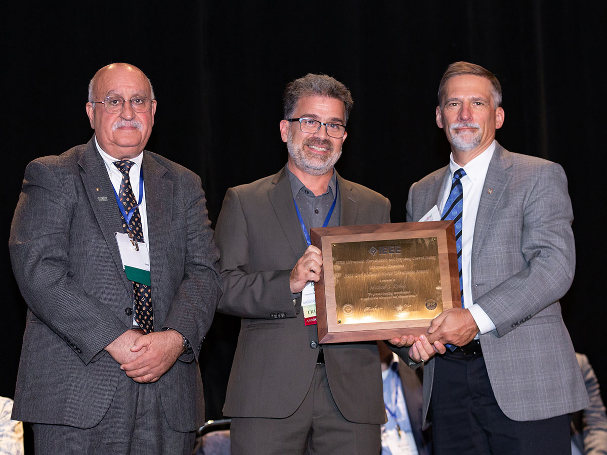 Professor Michael Kolios being awarded the IEEE Carl Hellmuth Hertz Ultrasonics Award