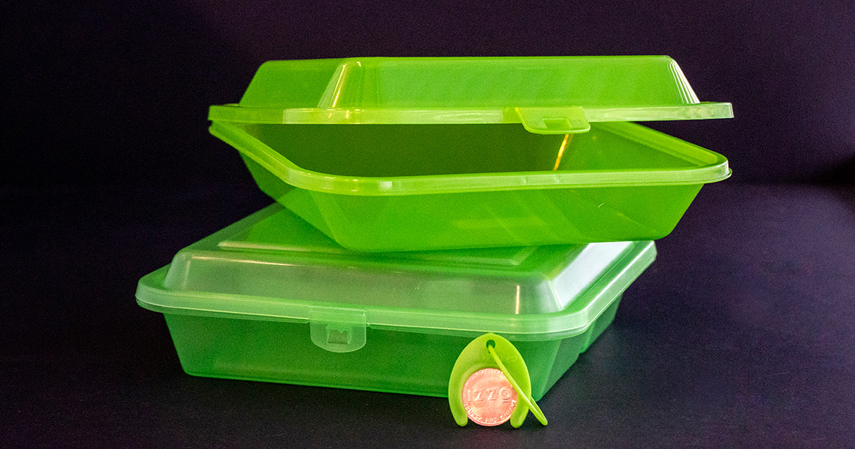 Green OZZI containers.